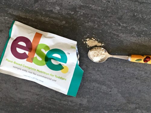 ELSE plant-based baby formula on a spoon
